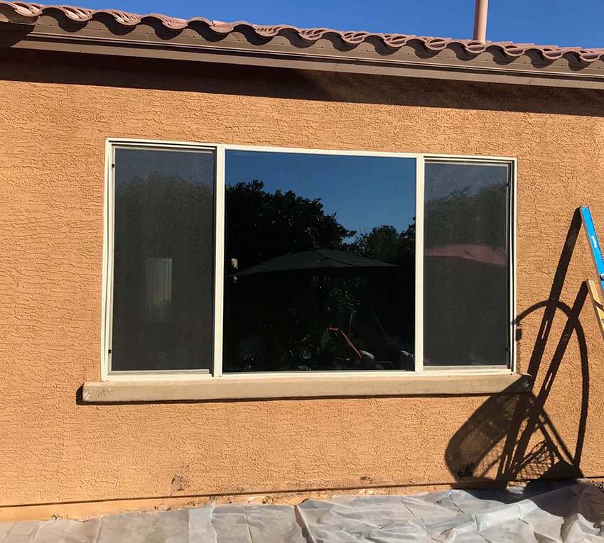 A house with a window replaced by a reputable company.